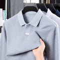 Men's loose fit cotton polo shirt with lapel collar and long sleeves in grey