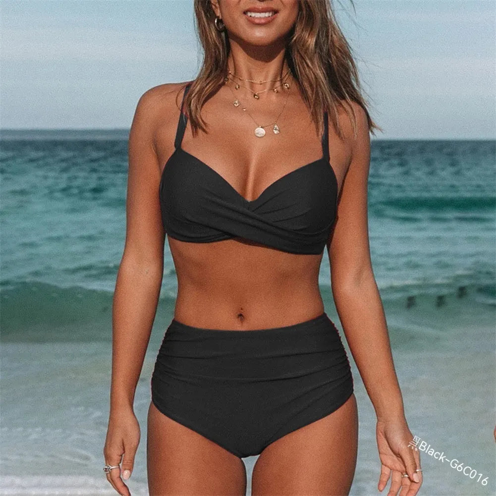 Women's solid colour cross strap bikini swimsuit in nylon fabric.
