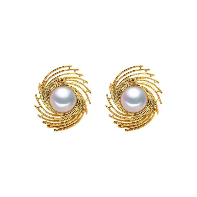 Vintage style earrings with simulated pearl drops in irregular flower shape design