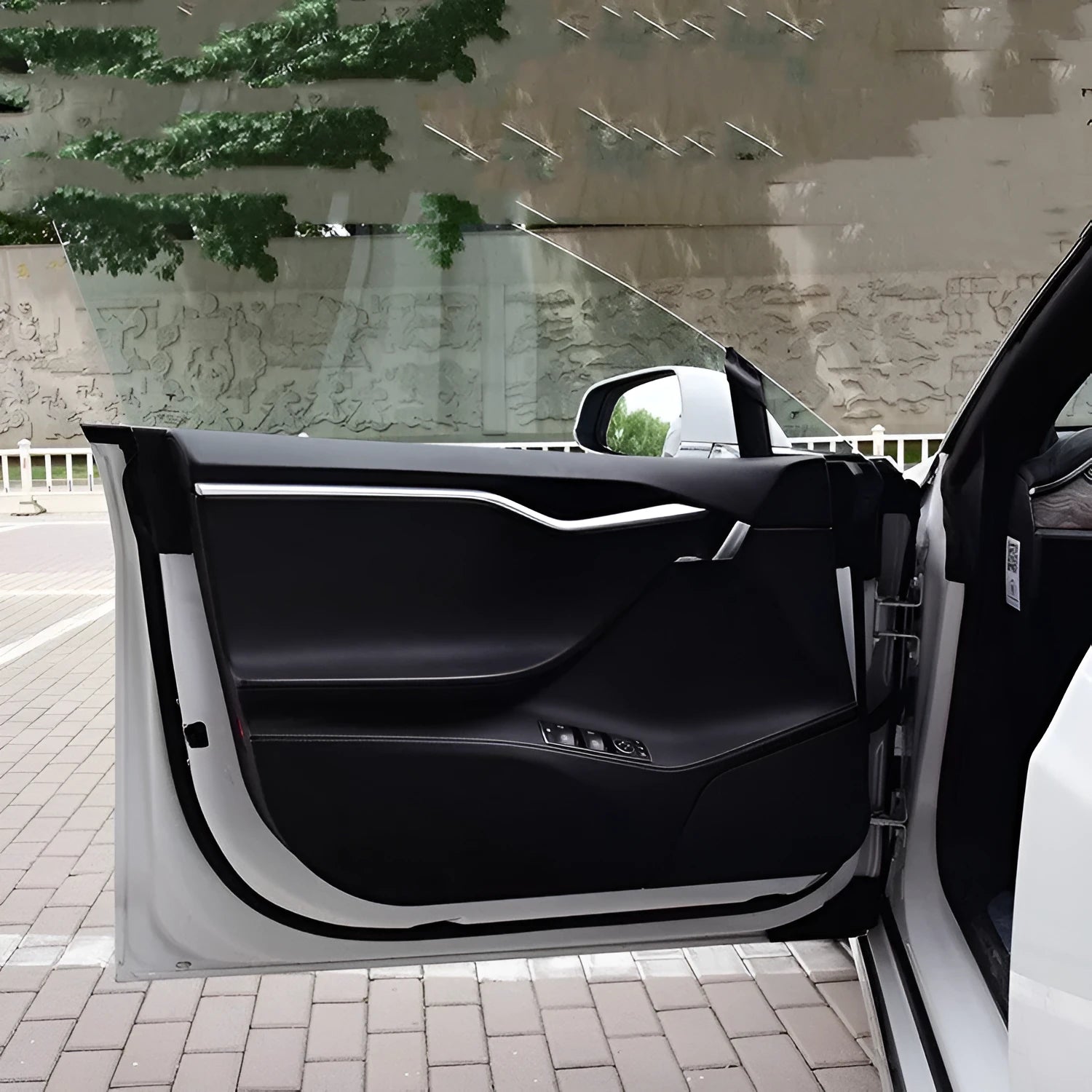 Carbon fiber anti scratch protective film applied to Model S front and rear door internal control panels