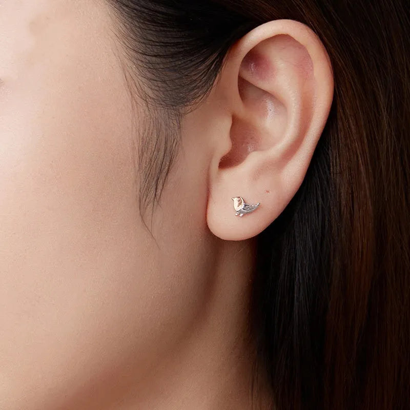 S925 sterling silver three-dimensional bird ear studs in colour SCE1944, supplied as a pair