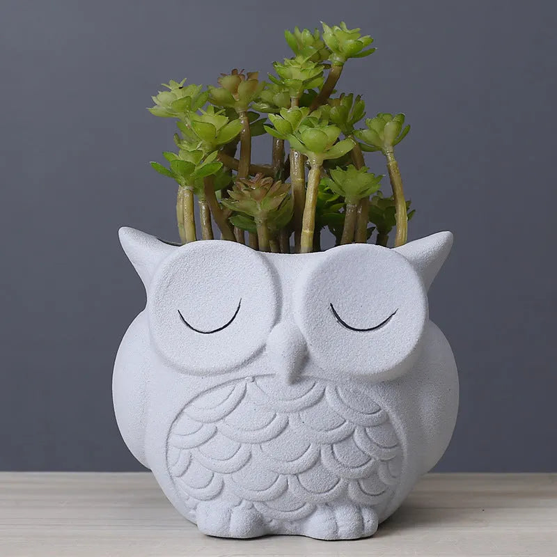 Handmade frosted ceramic flower pot with a cartoon owl design for succulents.