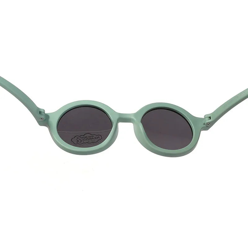 Children's silicone sunglasses with round frame for 0-3 year olds showing colour options