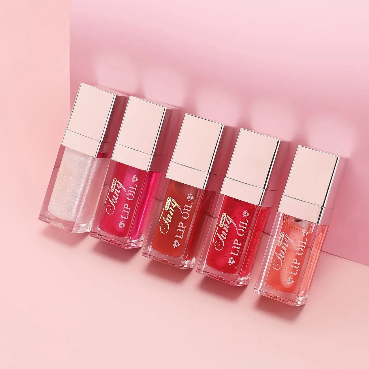 Five lip gloss and lipstick applicators in shades Style001, Style006, Style007, Style012, and Style015.
