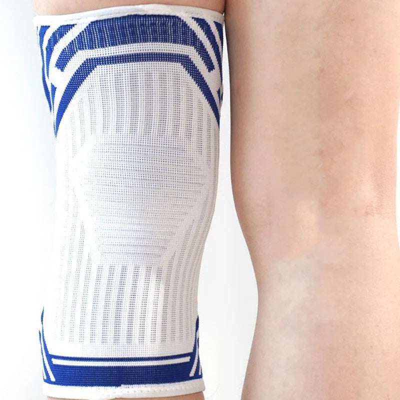 Blue high elasticity cotton knee pads shown on a knee, for adult basketball and sports.