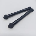 Double-headed miter sponge concealer brush with black artificial fibre bristles and wooden handle