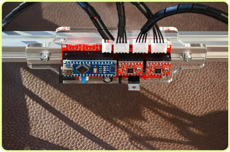 Miniature desktop laser engraving machine with a 400mm by 300mm base plate.