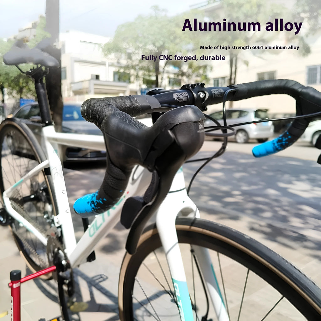 Black aluminium alloy road bike bent handlebar showing clamp area and printed size marking.