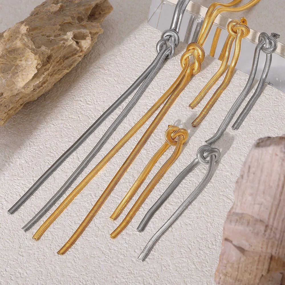 Gold electroplated titanium steel necklace with knotted tassel pendant and matching earrings set for women