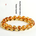 Natural yellow citrine geometric bracelet with multiple bead size options on wrist