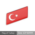 Aluminium national flag car sticker in a parallelogram shape measuring 6.3 by 3 centimetres.