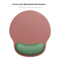 Silicone mouse mat with integrated wristband in gradient blue black colour pattern on desk
