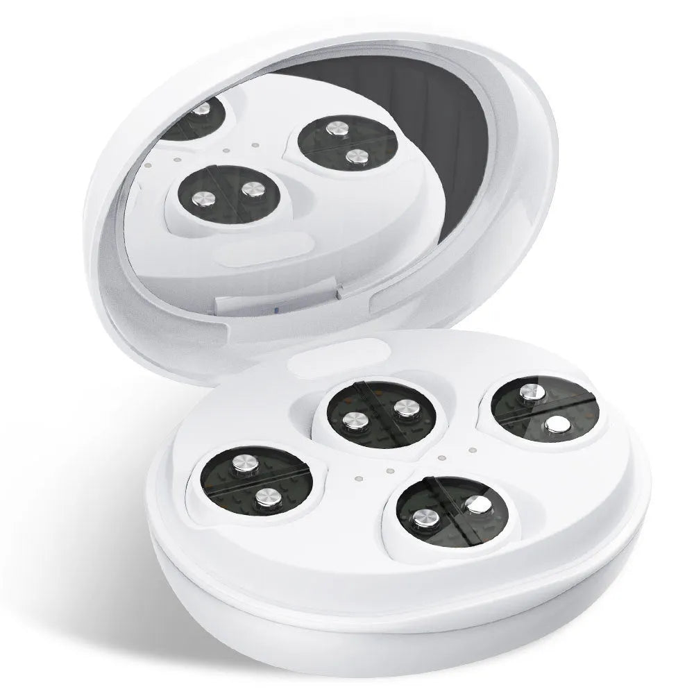 White wireless red light EMS facial and eye massage beauty device on a clean background.