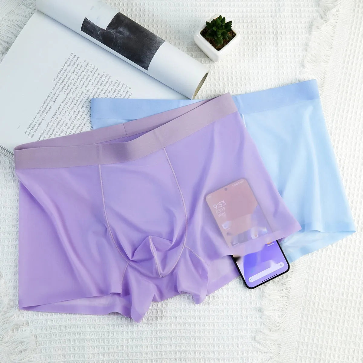 Ultra-thin ice silk seamless boxer briefs in solid colours including white, purple, pink, sky blue, and black