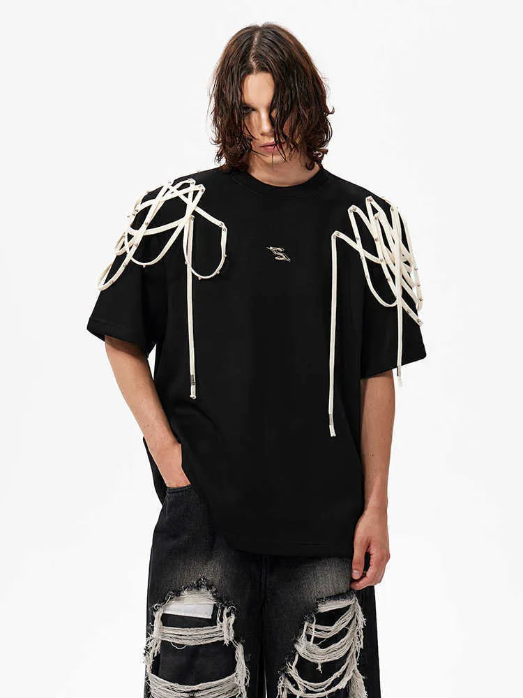 Black loose fit T-shirt with rivet ribbon padded shoulders, short sleeves, round neck