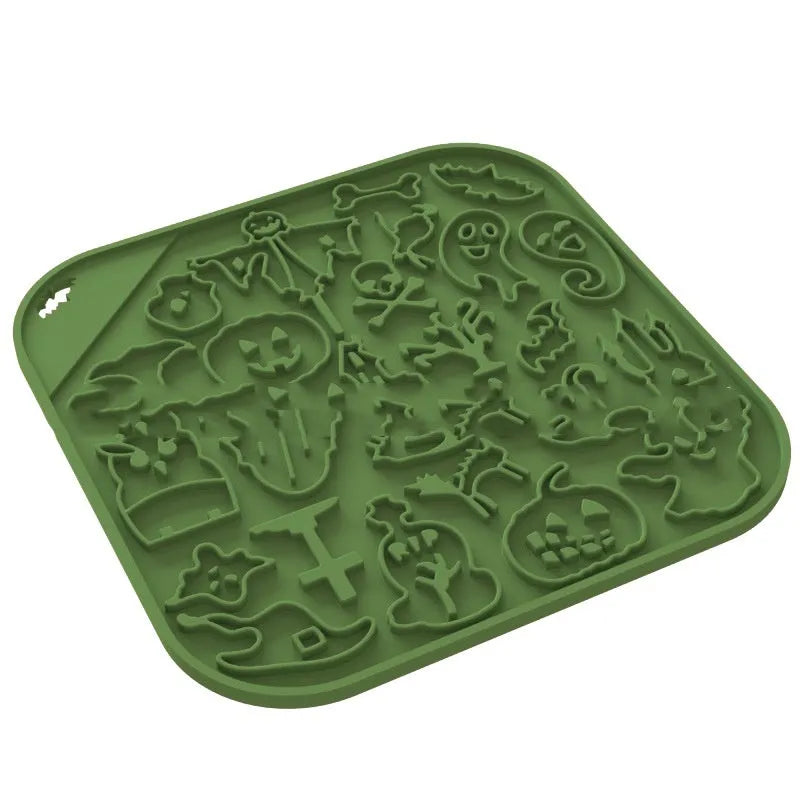 Edible silicon anti-choke slow feeding dog bowl in Halloween orange colour on floor