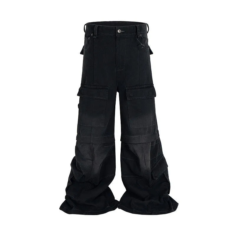 Black washed-out cotton detachable overalls with multiple pockets on a hanger.