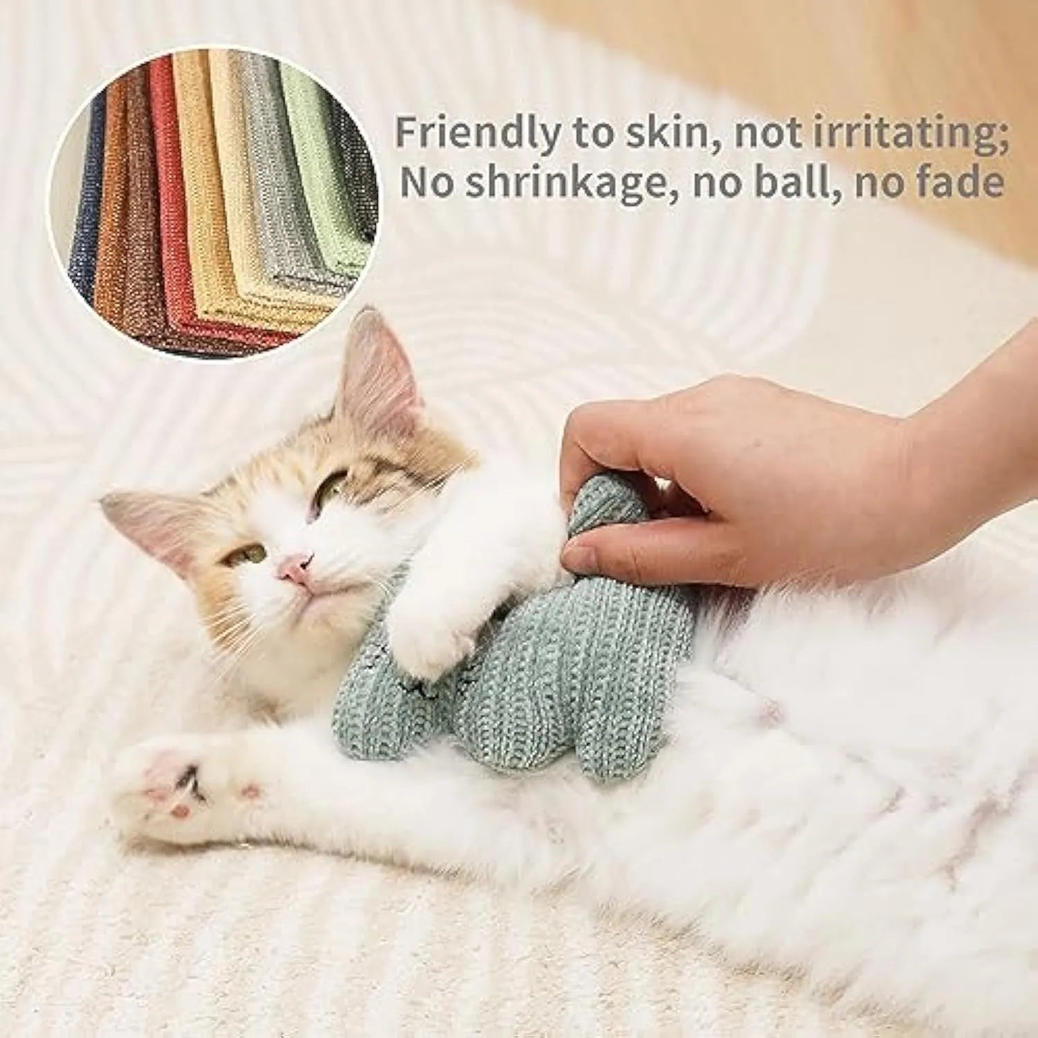Cyan plush cat toy with a rope tail and bell, shown next to a light coffee coloured version.