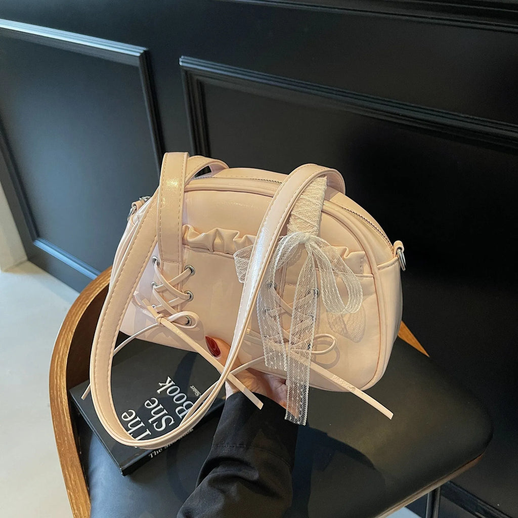 Women's bandage bow design PU leather shoulder handbag with mobile phone compartment in milky white colour