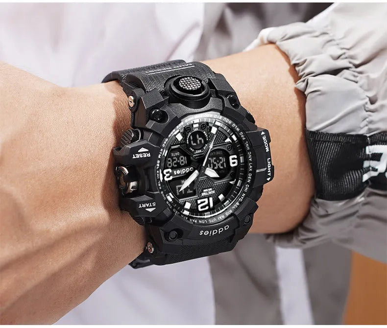 Men's black electronic sports watch showing analogue hands and a digital display on a plastic strap