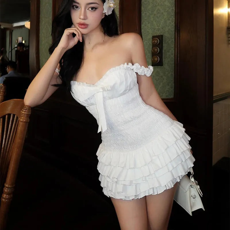 White polyester halter neck dress for women, sleeveless with short skirt and splicing detail, sizes S M L