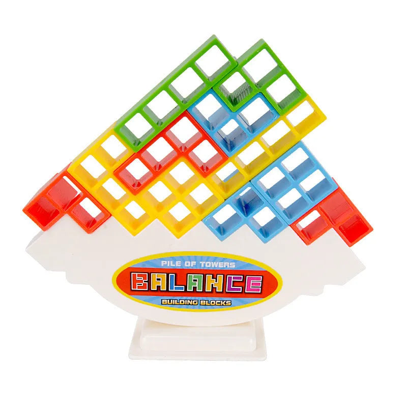 Plastic balance stacking game with 16 coloured blocks, chassis, and base on a table.