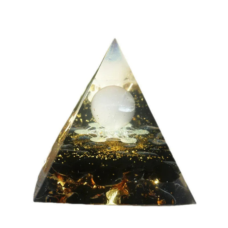 Small 6cm crystal epoxy resin pyramid decoration with natural gravel, shown in a selection of colours including lapis lazuli and obsidian.