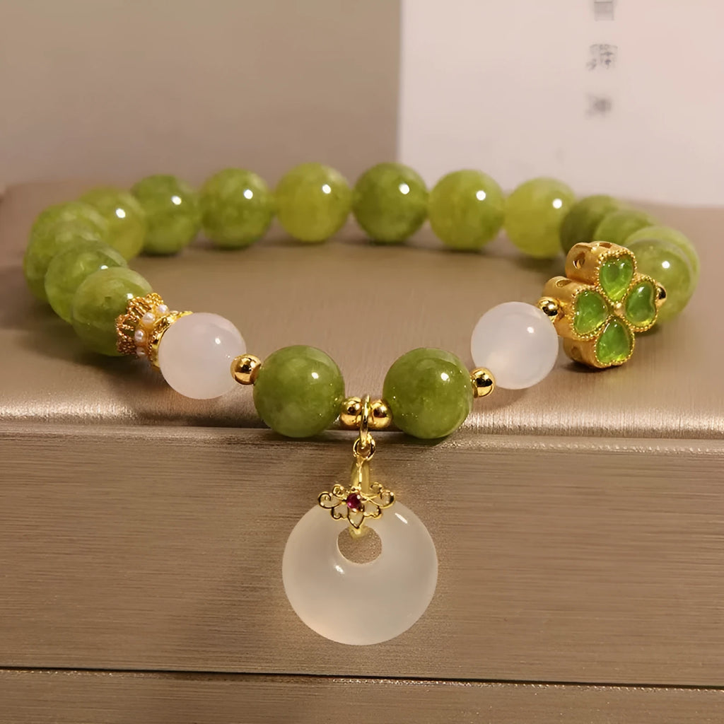 Natural green tourmaline women's bracelet with four-leaf clover design and safety buckle in New Chinese style