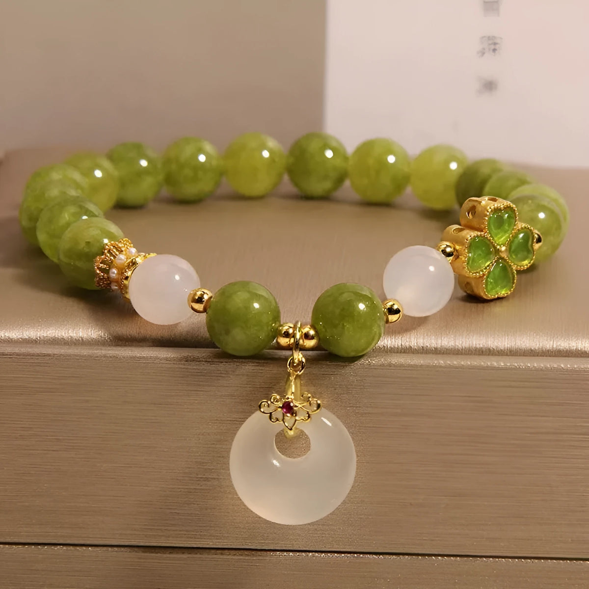 Natural green tourmaline women's bracelet with four-leaf clover design and safety buckle in New Chinese style