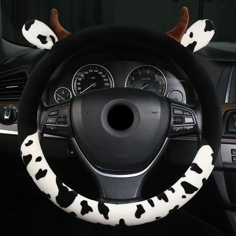 Short plush automotive steering wheel cover in black colour with protective handle design