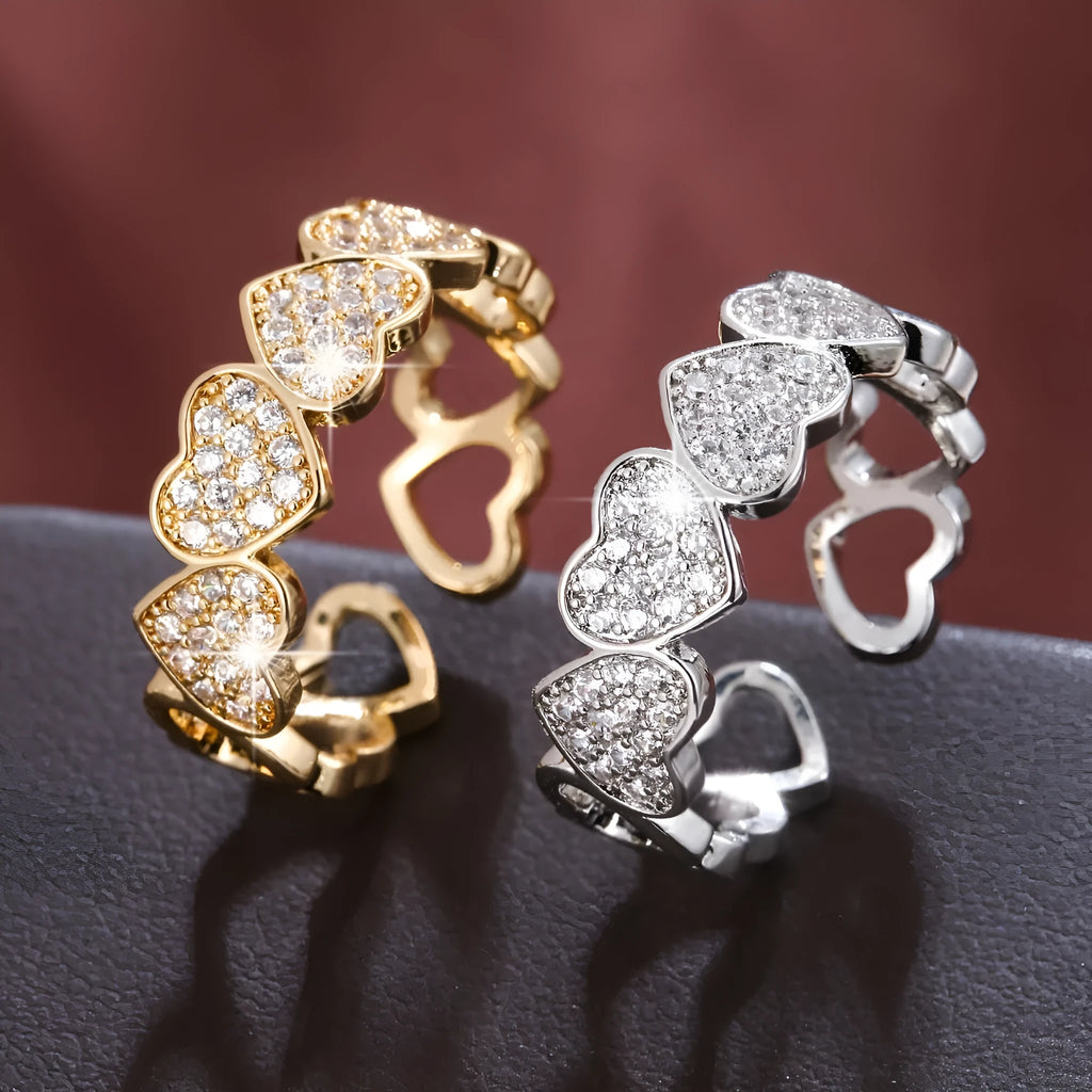 Adjustable opening geometric couple's ring with love/heart design in gold or silver colour