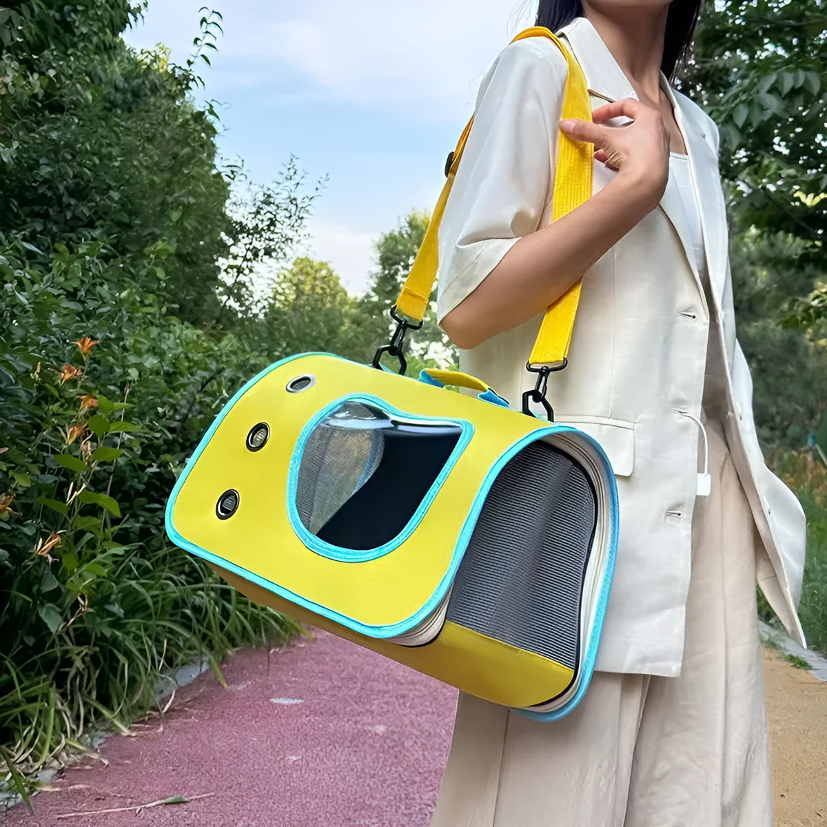 Portable breathable pet bag in Oxford PVC, medium-hard, solid colour, available in five colours