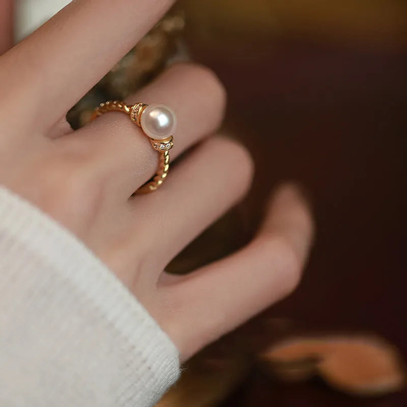 Geometric copper ring with pearl inlay and adjustable antique twist band