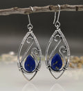 Retro geometric ellipse earrings in antique silver turquoise with lapis string winding, one pair