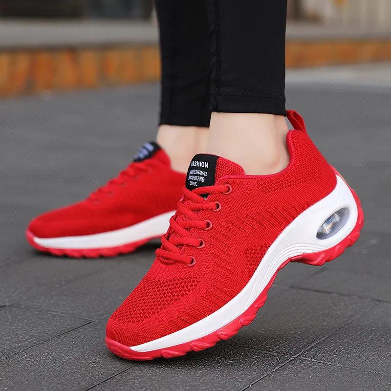 Red and black women's round toe lace-up mesh sneakers with low top and mid heel on PU sole