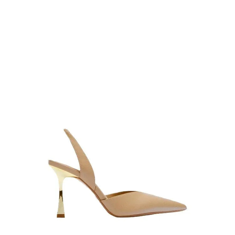 Women's pointed toe patent leather high heels in apricot nude colour, showing shallow mouth design.