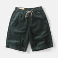 Men's khaki cargo shorts with multiple pockets and straight leg cut