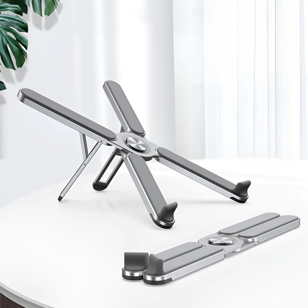 Foldable aluminium alloy laptop stand with 280mm base plate in silver or black, folded size 280 x 23.5 x 46.5mm.