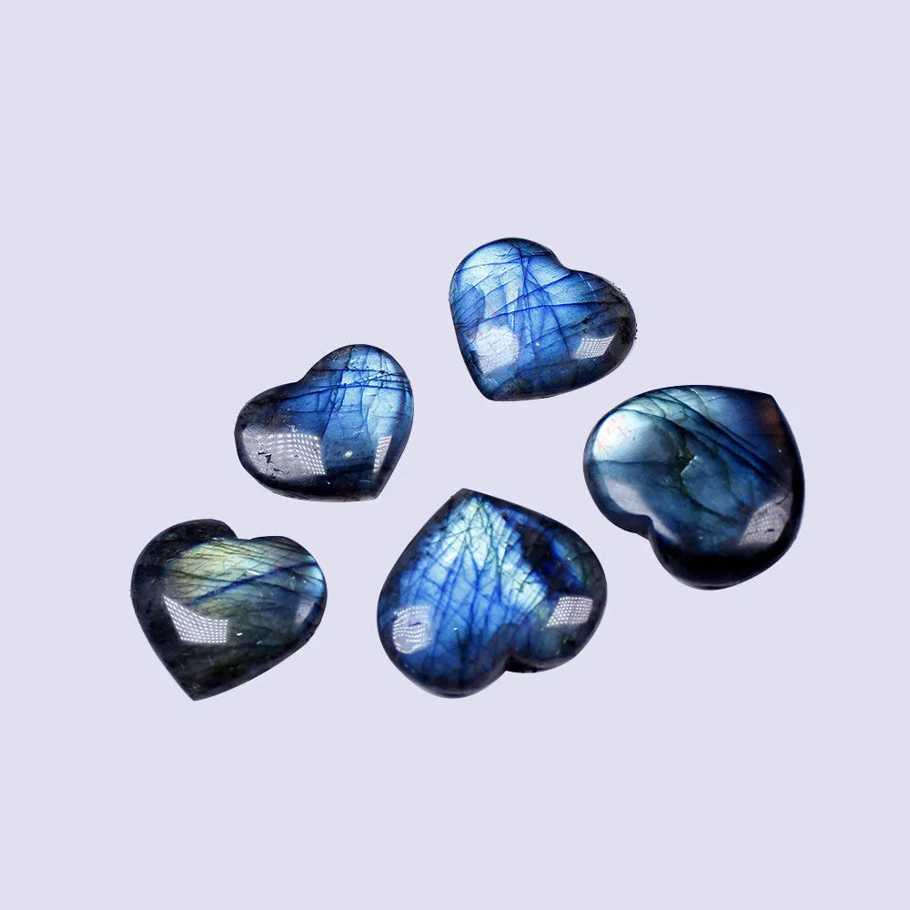 Natural pulled feldspar crystal pendant piece showing heart and ocean patterns, with size scale from 22mm to 45mm.