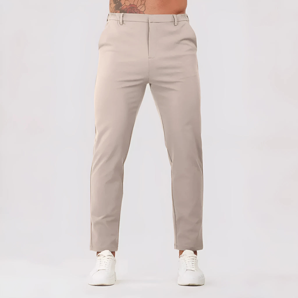 Men's solid colour suit trousers in mid waist, straight leg, small feet opening, polyester blend, available in five colours.