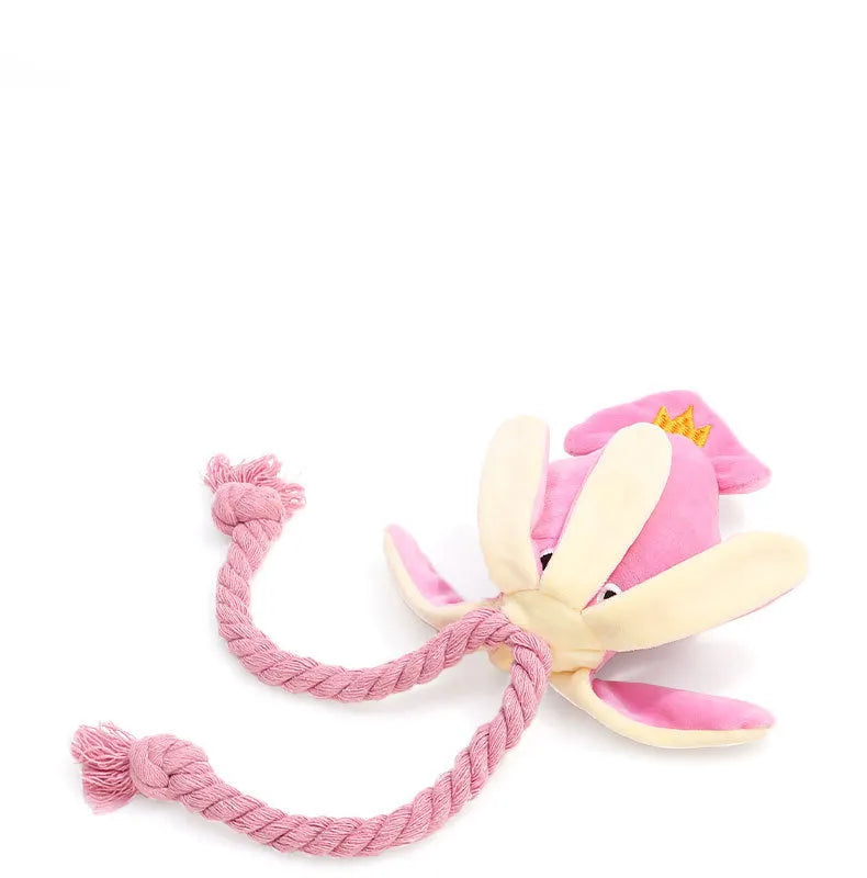 Pink plush squid pet toy with squeaker and rope tentacles