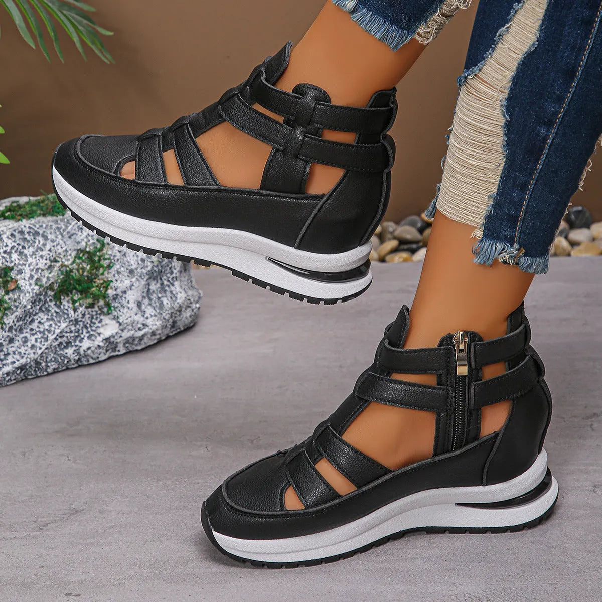Women's black hollow-out platform sandals with a Velcro strap and round toe.