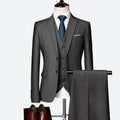 Men's three-piece slim-fit suit set showing jacket, trousers, and waistcoat in multicolour options including black, grey, and navy