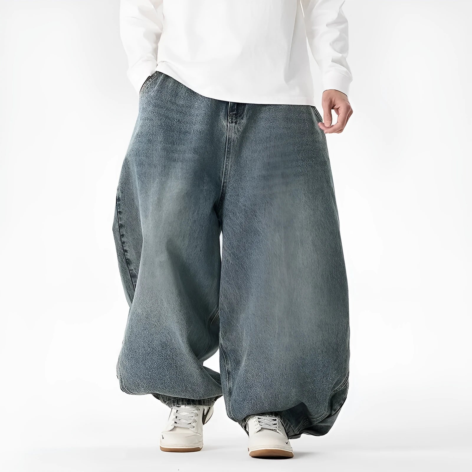 Men's plus size wide leg baggy jeans in black denim on a hanger