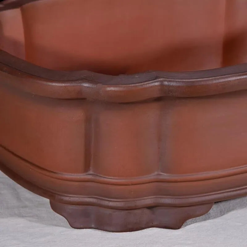 Chinese-style antique finish purple clay oval flowerpot measuring 71cm long by 54cm wide