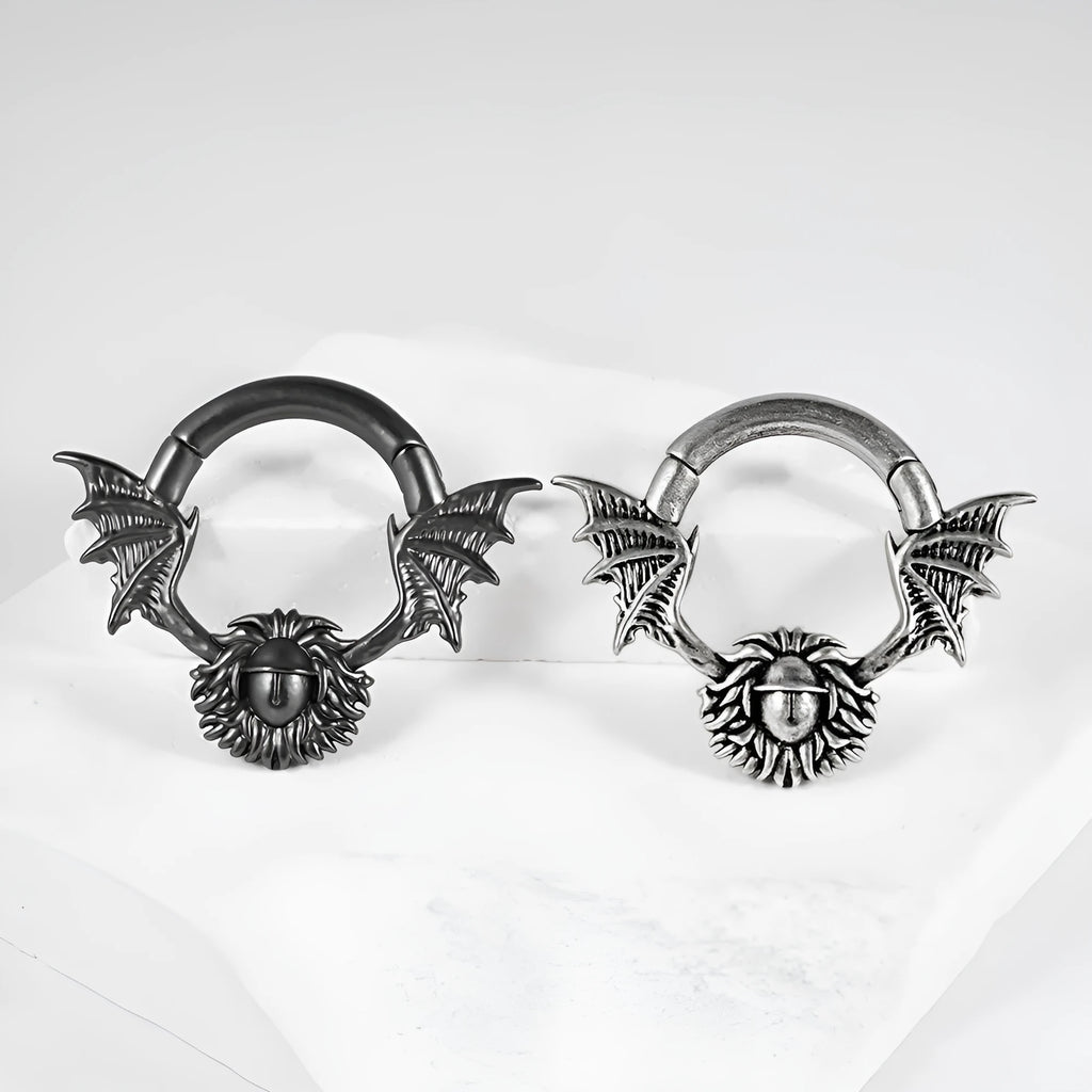 A pair of geometric sharp cone round ear tunnel stretchers with a magnetic closure, made from copper.