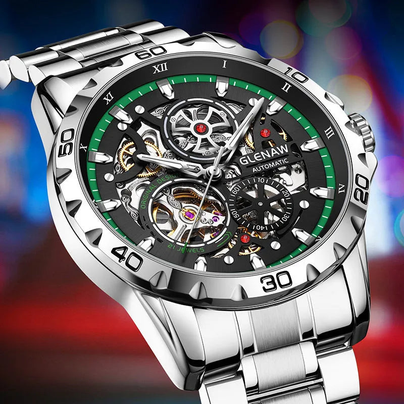 Silver men's automatic watch with hollow-out dial showing mechanics, luminous markers, and a blue stainless steel strap.