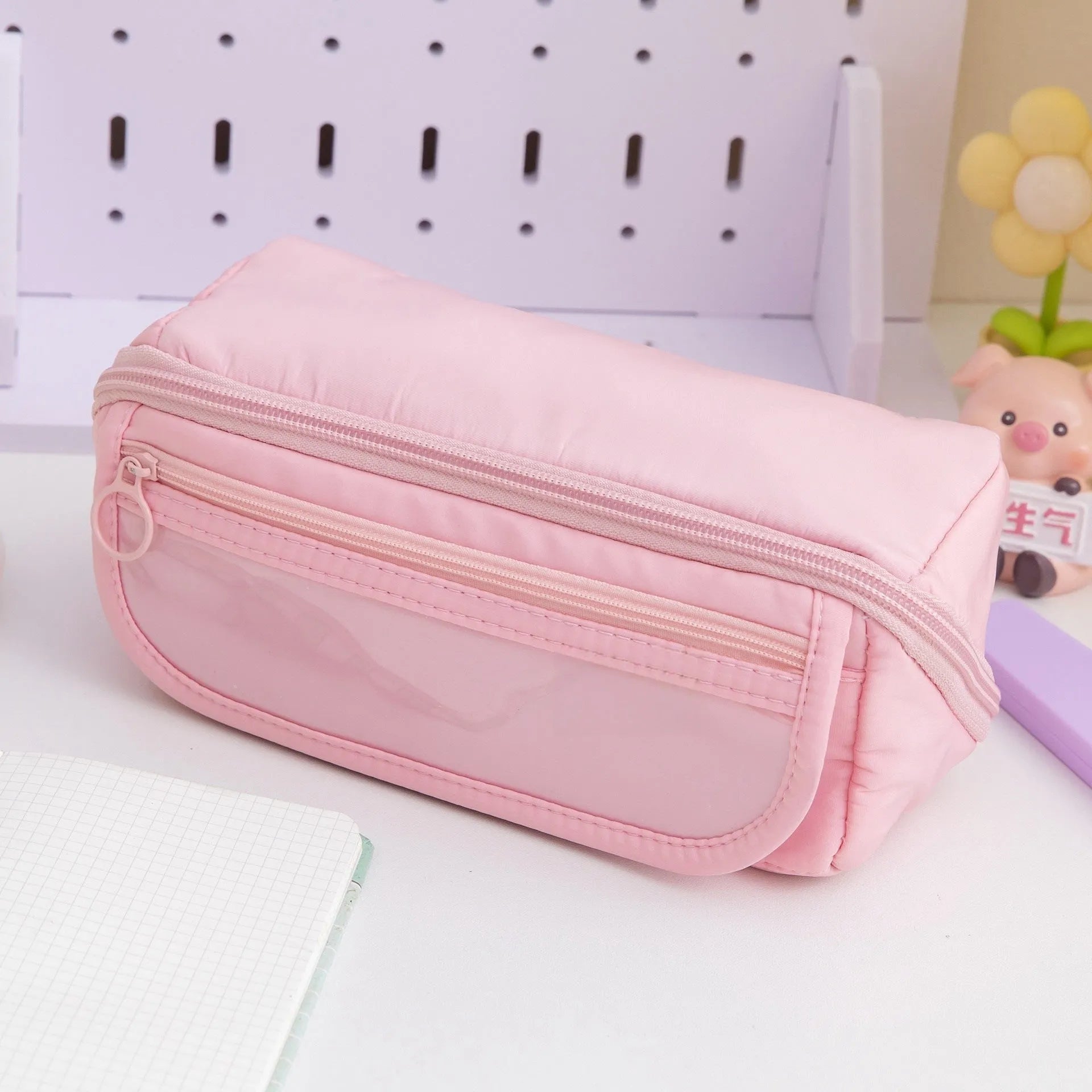 Korean style canvas pencil case with ten-layer flip design open to show multiple pen compartments.