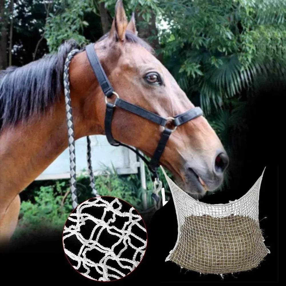 Woven grid horse feeding bag hanging with hay, shown in black colour