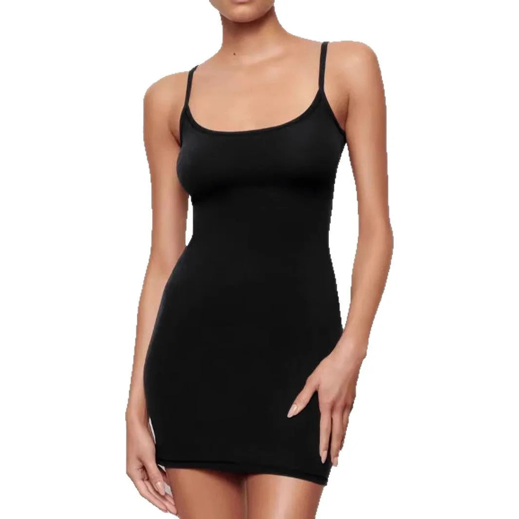 Black sleeveless sling sheath dress with a short skirt on a mannequin.